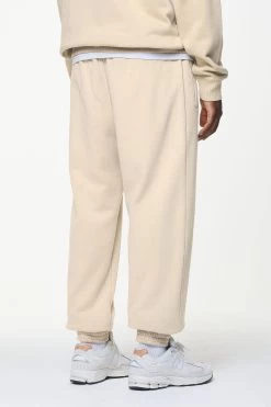 Logo Heavy Sweat Jogger Vintage Washed Kingdom Beige -Pegador® PGDR BUILD TO LAST PANTS MENS0164 1