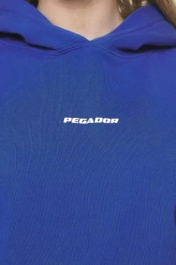 Clarita Logo Oversized Hoodie Washed True Blue White Gum -Pegador® PGDR NEVER TOO LATE ECOMMERCE 2 FEMALE BLUE55